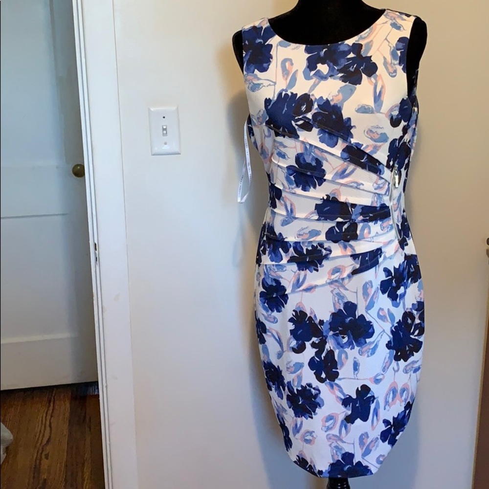 White dress with blue and pink floral design
